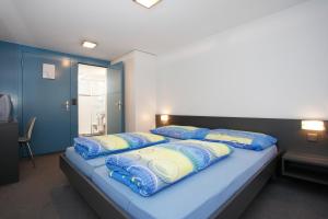 Voodi või voodid majutusasutuse Hotel Krone toas