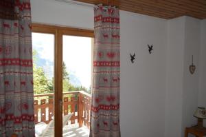 Balkón nebo terasa v ubytování "Chalet le Dahlia - 4 Vallees"