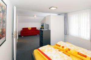 Voodi või voodid majutusasutuse Hotel Krone toas