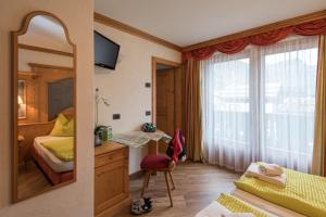 Voodi või voodid majutusasutuse B&B Via Vai toas