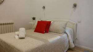A bed or beds in a room at Casa de Huéspedes Prada