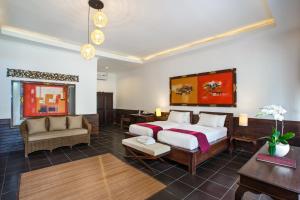 Area soggiorno di Ubud Raya Boutique Hotel