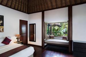 เตียงในห้องที่ Mali Resort Pattaya Beach Koh Lipe