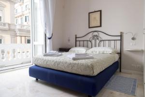 Llit o llits en una habitació de Casa San Carlo