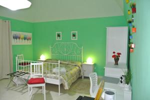 A bed or beds in a room at Mamma Puglia Suite & Breakfast