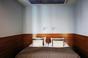 Postel nebo postele na pokoji v ubytování Boutique Hotel Yöpuu