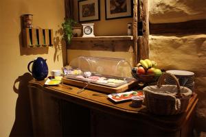 a kitchen counter with a bowl of fruit on it at Altstadt-Pension Koch in Goslar