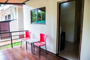 Ein Balkon oder eine Terrasse in der Unterkunft Lazy Frog Guest House