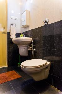 Ein Badezimmer in der Unterkunft Lazy Frog Guest House