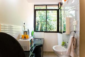 Ein Badezimmer in der Unterkunft Lazy Frog Guest House