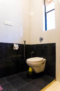Ein Badezimmer in der Unterkunft Lazy Frog Guest House