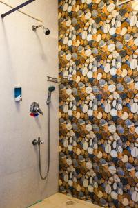 Ein Badezimmer in der Unterkunft Lazy Frog Guest House