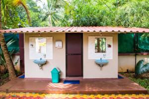 Ein Garten an der Unterkunft Lazy Frog Guest House