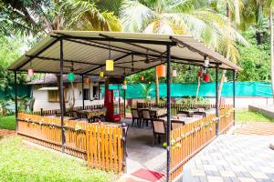 Ein Restaurant oder anderes Speiselokal in der Unterkunft Lazy Frog Guest House 