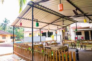 Ein Restaurant oder anderes Speiselokal in der Unterkunft Lazy Frog Guest House 