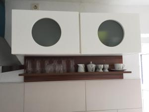 Kuchyň nebo kuchyňský kout v ubytování Apartment Fabio