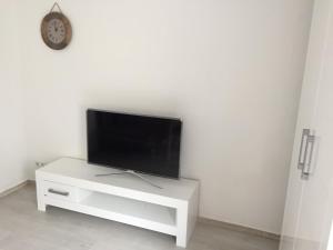 TV a/nebo společenská místnost v ubytování Apartment Fabio + 6 fotografií