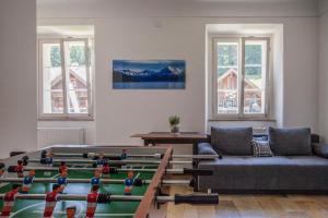 a living room with a couch and a table with legos on it at Life Camp in Hinterstoder