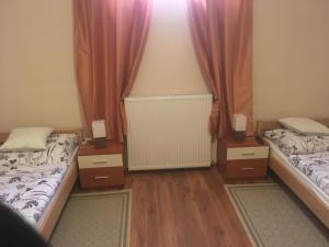 Postel nebo postele na pokoji v ubytování Apartman Sveti Rok