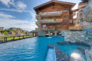 Bazén v ubytování Apartment La Forêt 5 - Spa access - Centre Station nebo v jeho okolí