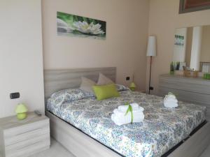 Postel nebo postele na pokoji v ubytování La Collina di Parthenope Vomero