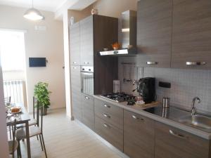 Kuchyň nebo kuchyňský kout v ubytování La Collina di Parthenope Vomero