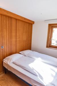 Chesa Ilaria - St. Moritzにあるベッド