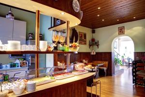 Kuchyň nebo kuchyňský kout v ubytování Hotel Kallmeyer