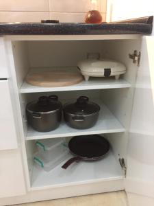 Kuchyň nebo kuchyňský kout v ubytování Apartman Jezdić