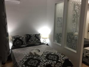 Postel nebo postele na pokoji v ubytování Apartman Jezdić