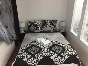 Postel nebo postele na pokoji v ubytování Apartman Jezdić