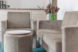 Posezení v ubytování Hotel Schelf GmbH & Co. KG