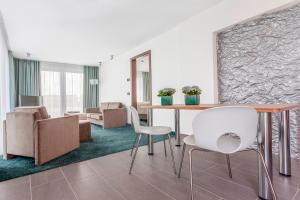 Posezení v ubytování Hotel Schelf GmbH & Co. KG