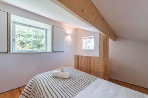 Postel nebo postele na pokoji v ubytování Casa Dona Olga River View