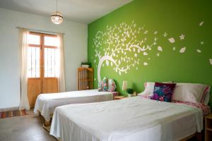 Postel nebo postele na pokoji v ubytování Azul Cielo Hostel