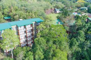 an aerial view of a hotel in the trees at Iguazu Jungle Lodge in Puerto Iguazú