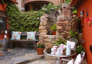 Vonkajšia záhrada v ubytovaní Casa Rosa Garden House