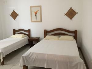 Postel nebo postele na pokoji v ubytování Hotel Lazer Piata
