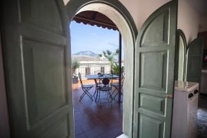 A balcony or terrace at Palazzo Viola Suite Panoramica Palermo