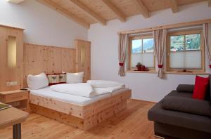 Cama ou camas em um quarto em Ferienhaus Zangerl