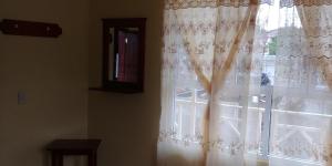 Televizors / izklaižu centrs naktsmītnē Hotel Don Fer