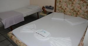 Postel nebo postele na pokoji v ubytování Hotel Don Juan