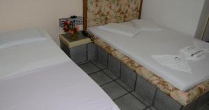 Postel nebo postele na pokoji v ubytování Hotel Don Juan