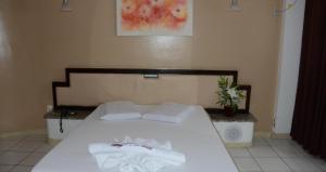Postel nebo postele na pokoji v ubytování Hotel Don Juan