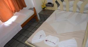 Postel nebo postele na pokoji v ubytování Hotel Don Juan