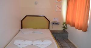 Postel nebo postele na pokoji v ubytování Hotel Don Juan