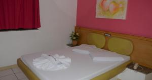 Postel nebo postele na pokoji v ubytování Hotel Don Juan