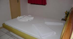Postel nebo postele na pokoji v ubytování Hotel Don Juan