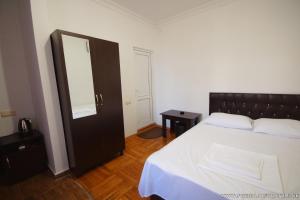 Postel nebo postele na pokoji v ubytování Pheria