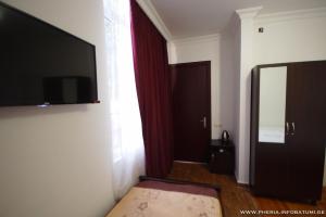 TV a/nebo společenská místnost v ubytování Pheria